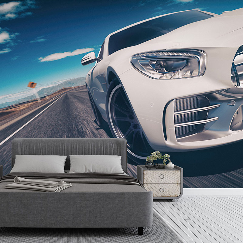 Foto tapeta Beli automobil na pustinjskom putu na zidu