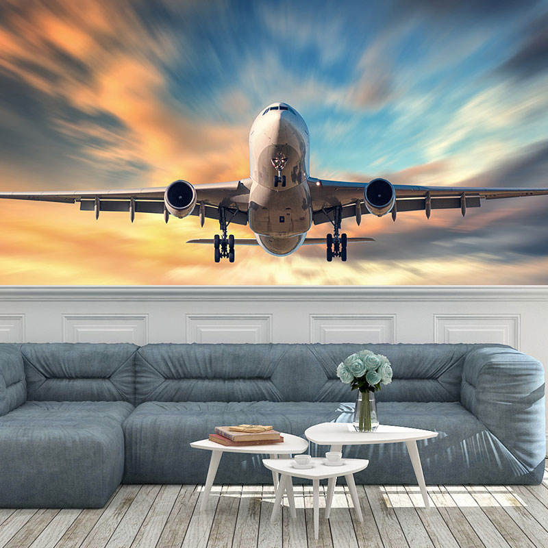 Foto tapeta Putnički avion u zalasku na zidu